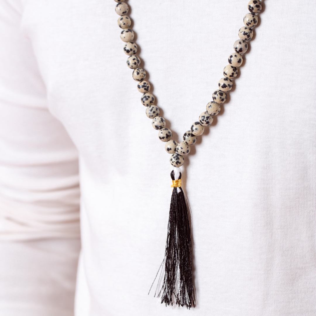 Close up of Man wearing Ambarya Playfulness - Dalmatian Stone Mala Bead Necklace
